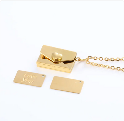 Gold envelope locket necklace with heart clasp, shown with the Love You and blank message plates